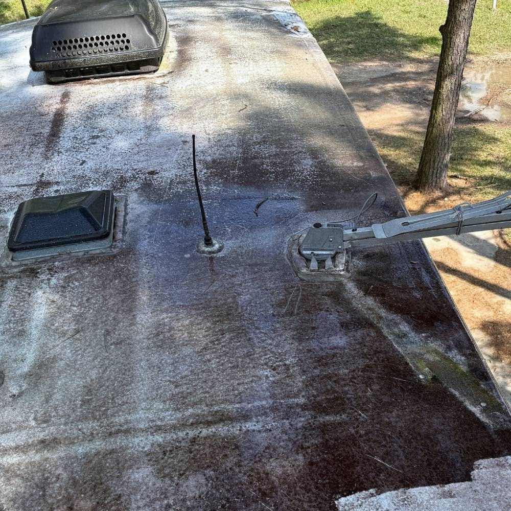 Dirty RV Travel Trailer Roof Before Cleaning and Sealing Of Vents In Conroe TX